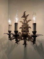Pair of Vintage Bronze Three Arm Wall Sconces with White Candlesticks