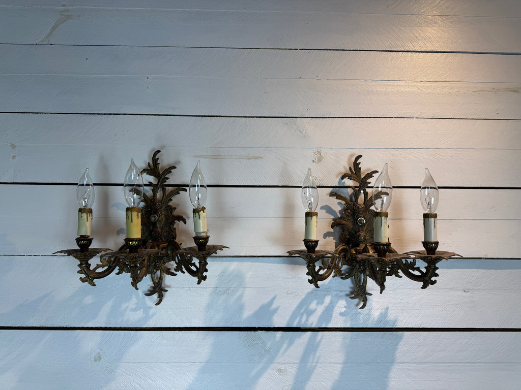 Pair of Vintage Bronze Three Arm Wall Sconces with White Candlesticks